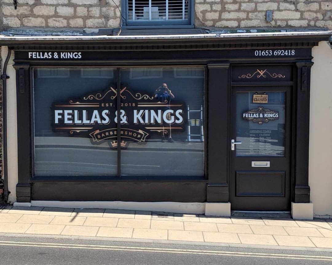 fellas and kings signage